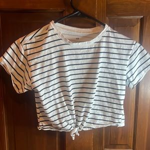 H&M cute stripped t-shirt! Has a super cute tie on bottom! Size 9-10